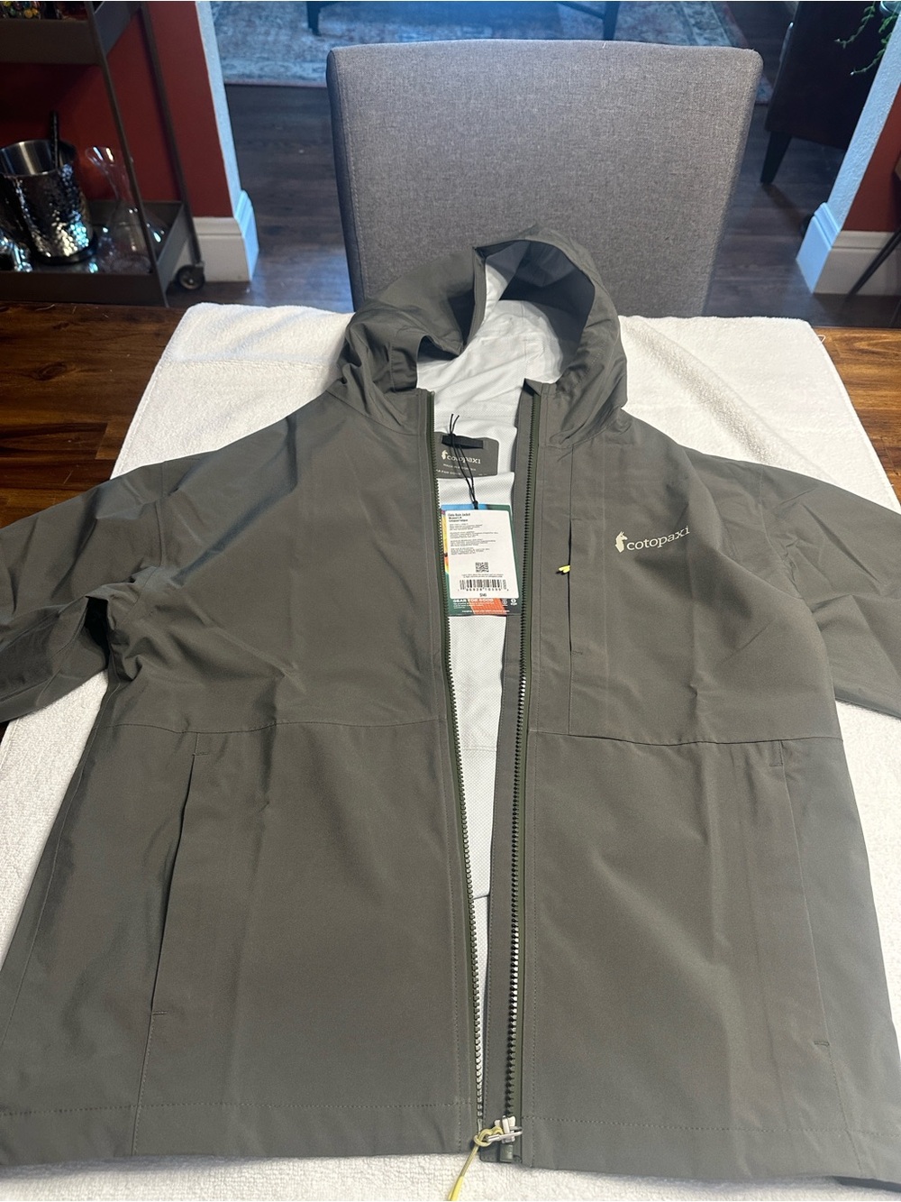 Cotopaxi Olive Green Women’s Hooded Raincoat